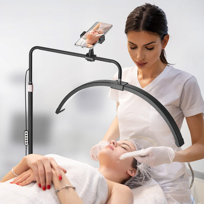 Halbmondförmige LED-Stehlampe für Kosmetikerinnen, 66 cm (26 Zoll) dimmbar, mit gebogener Form, Handyhalterung und Fernbedienung, für Schönheit, Hautpflege, Augenbrauen und Tattoos.
